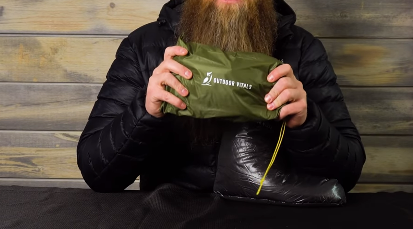 A hot water bottle inside the sleeping bag